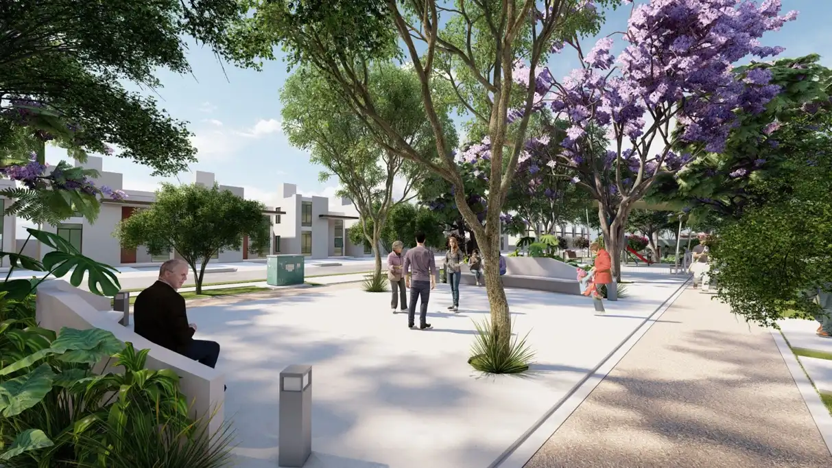 Plaza con jacarandas en el Parque Central de Bosques de Cholul